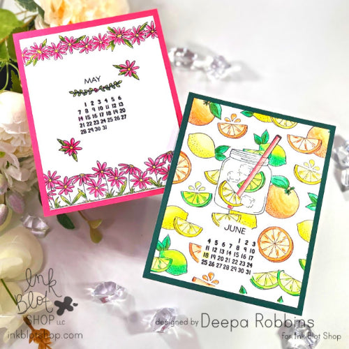 Two colorful calendar cards for May and June with floral and citrus designs, respectively. Brand 'Ink Blot Shop' is visible.