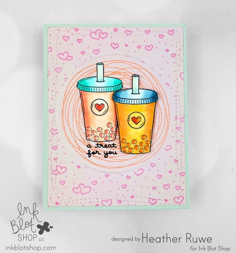 Card with two colorful bubble boba tea cups and heart designs on a pink background with hearts.