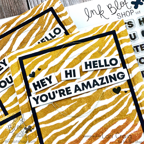 Handmade greeting cards with 'hey, hi, hello, you're amazing' text and zebra print pattern, featuring products from Ink Blot Shop